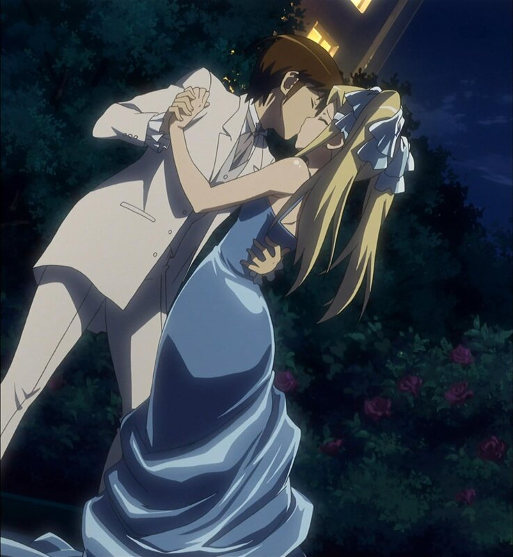couple kissing at night