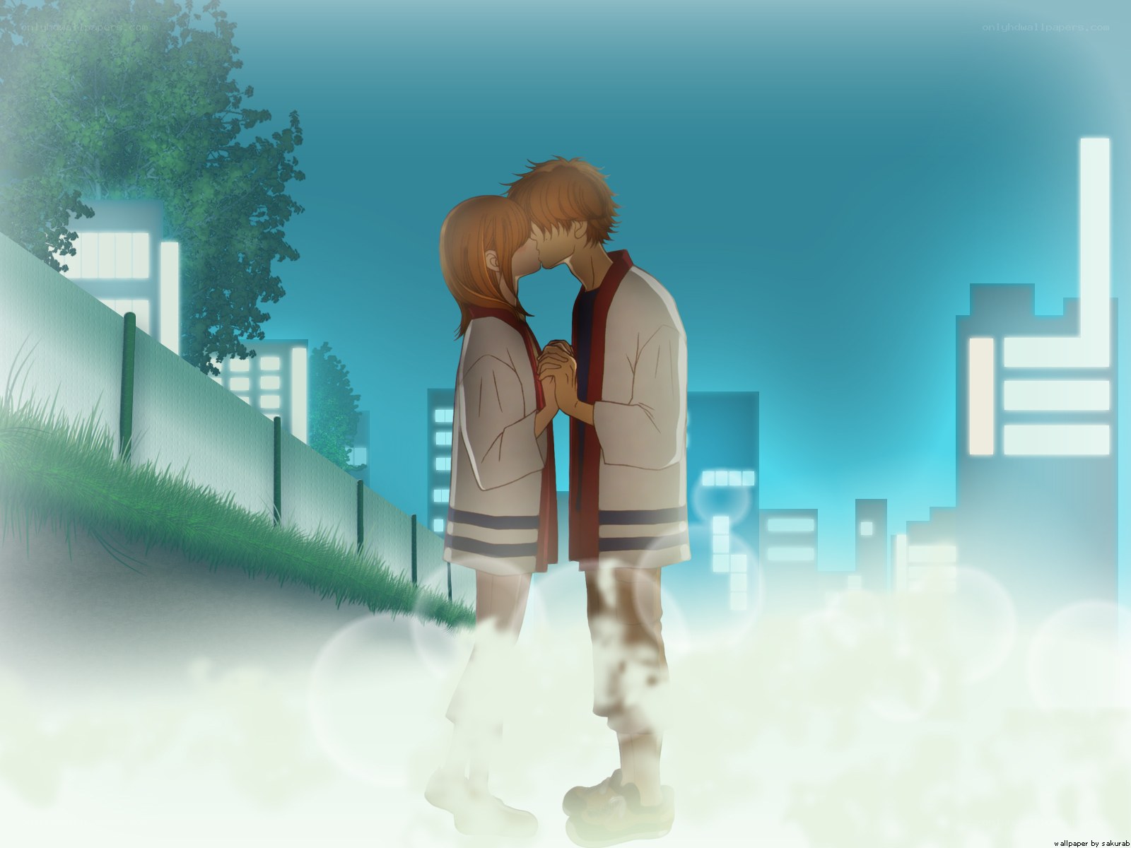 couple kissing at night