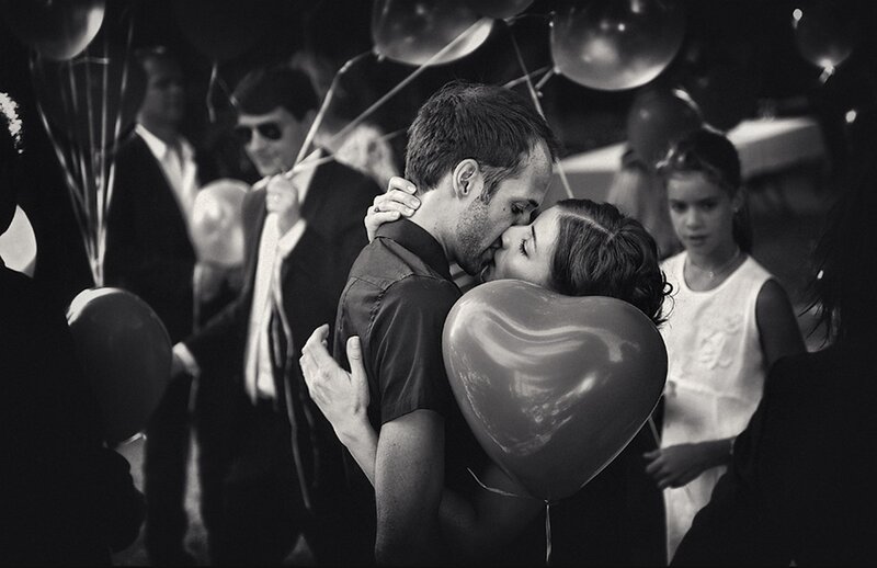 Couple Kissing at Party — Black