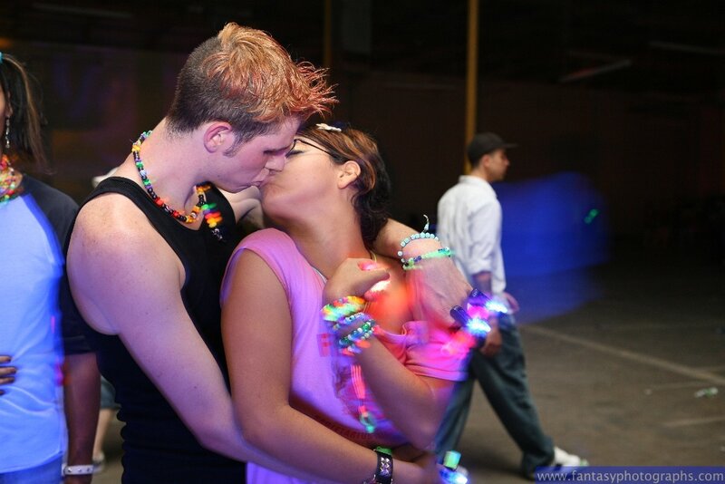 Couple Kissing at Party