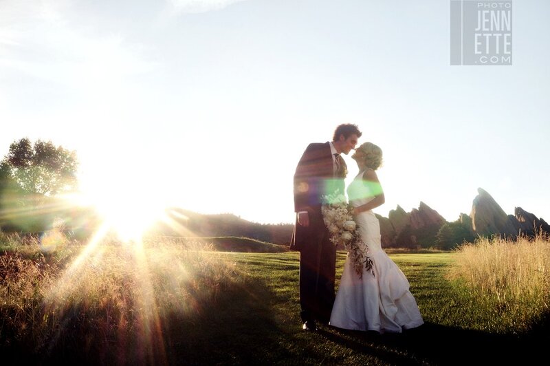 Couple kissing at sunset
