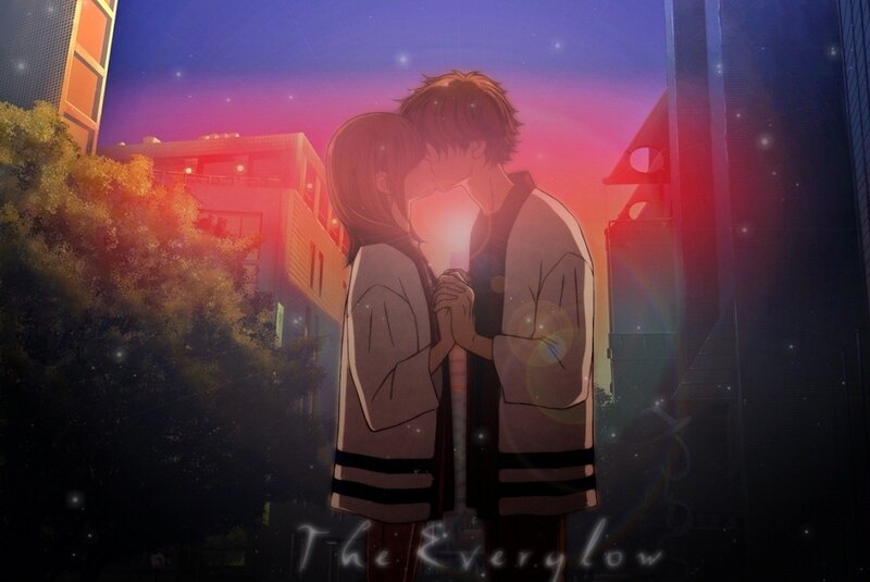 couple kissing at sunset