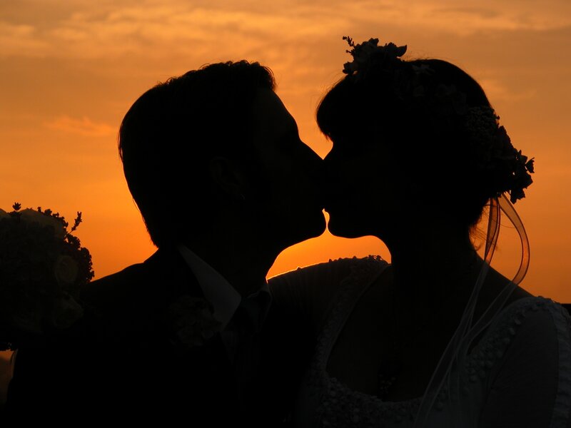 Couple Kissing at Sunset — Orange, Romantic, Photograph, Silhouette