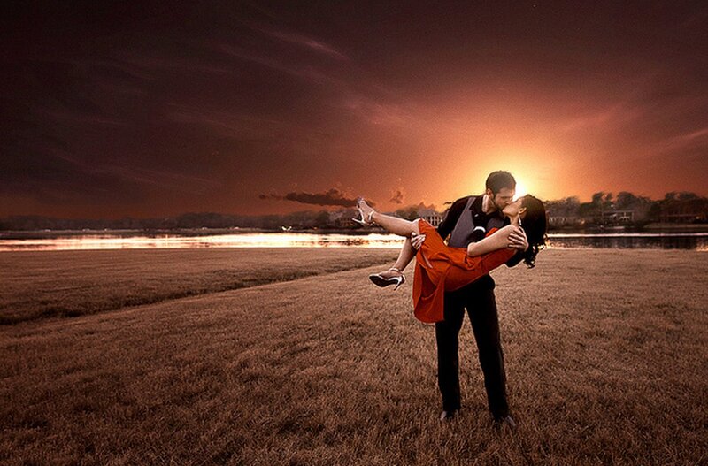 Couple Kissing at Sunset — Orange, Romantic
