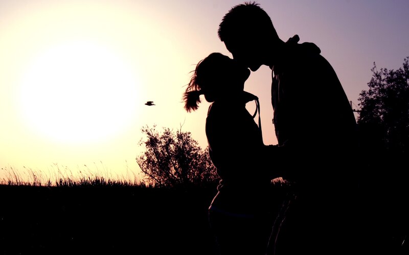 Couple Kissing at Sunset — Yellow, Romantic, Photograph