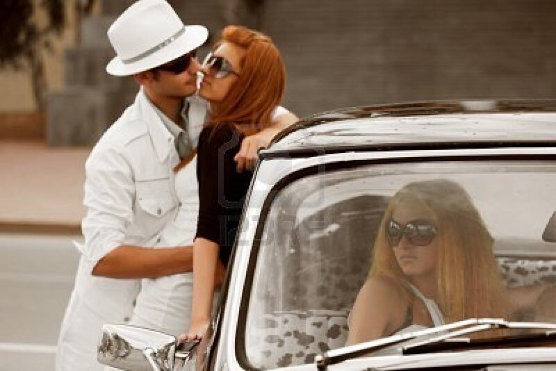 Couple Kissing by Car