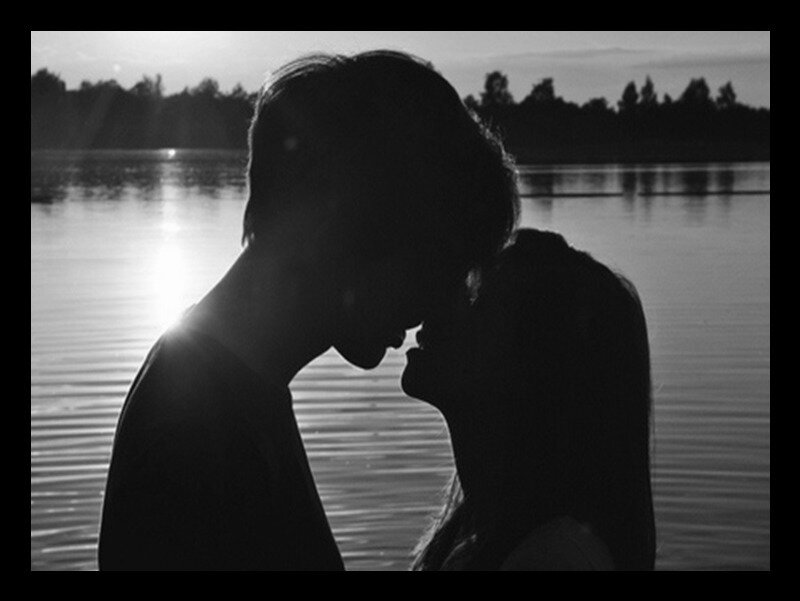 Couple Kissing by Lake