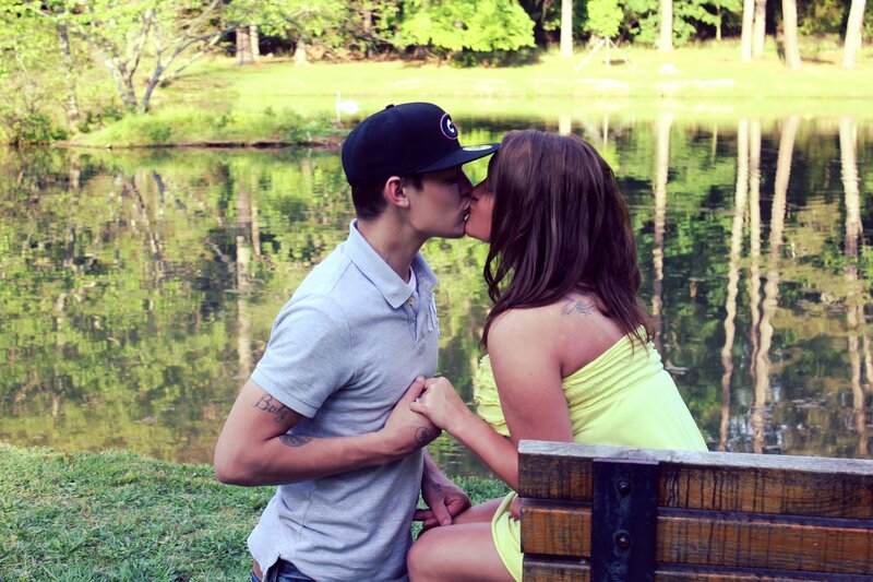 Couple Kissing by Pond