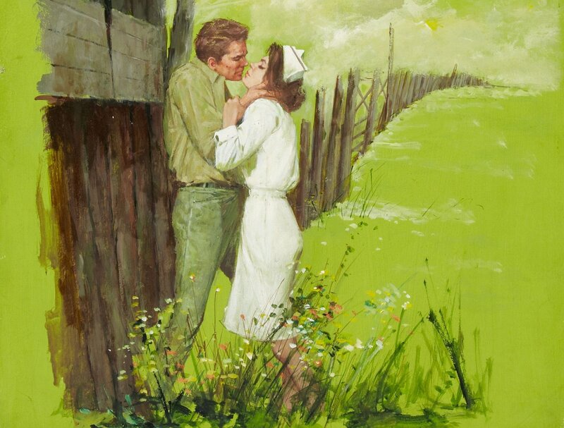 couple kissing in a field