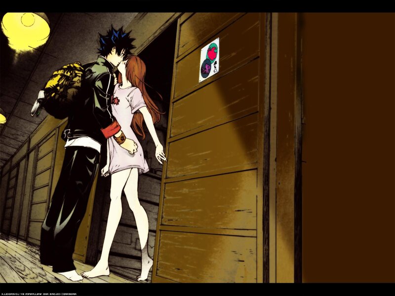couple kissing in alley