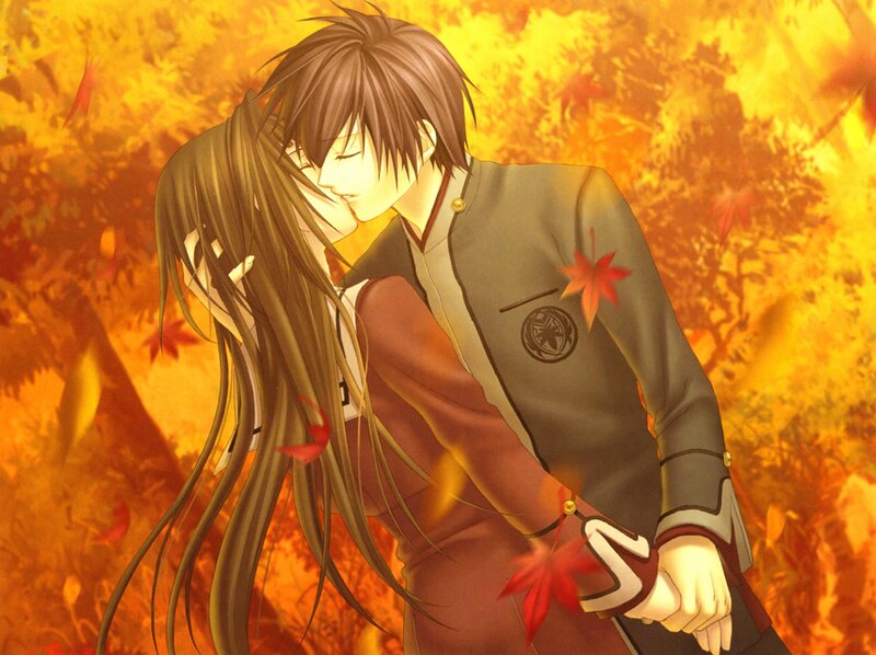 couple kissing in autumn