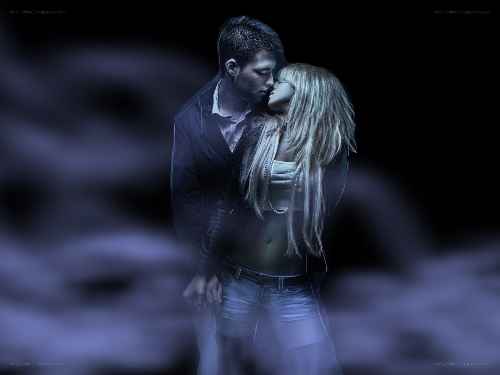 couple kissing in blue light