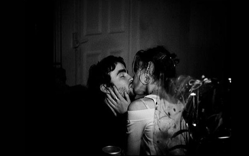 Couple Kissing in Dark Room