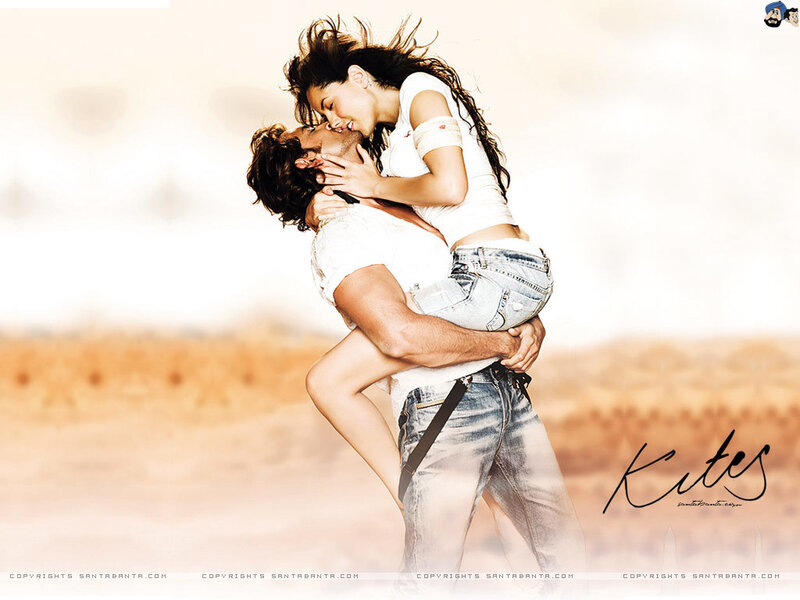 couple kissing in desert