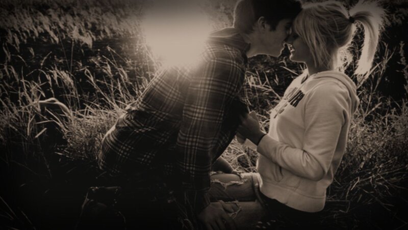 Couple Kissing in Field — Black