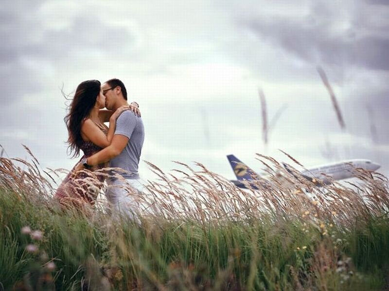 Couple Kissing in Field — Green, Romantic