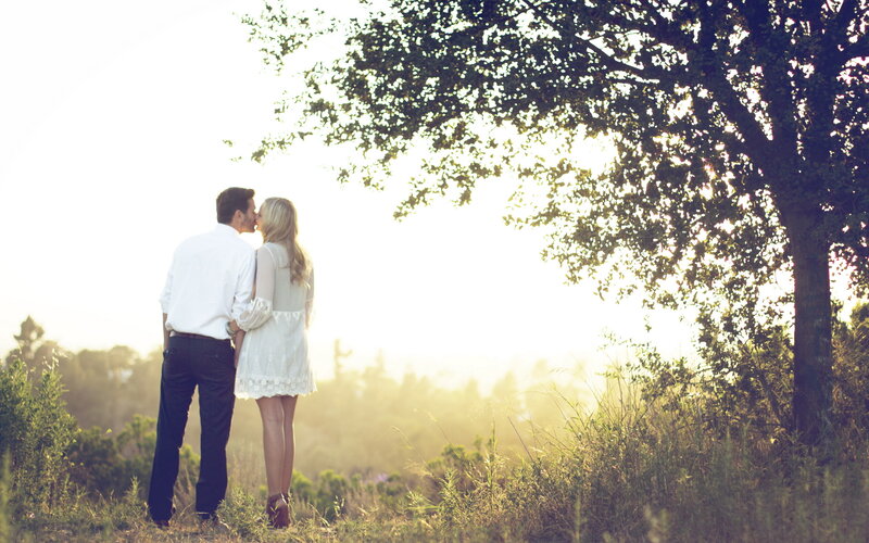 Couple Kissing in Field — Green, Serene