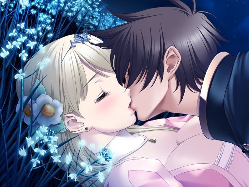 couple kissing in flower field