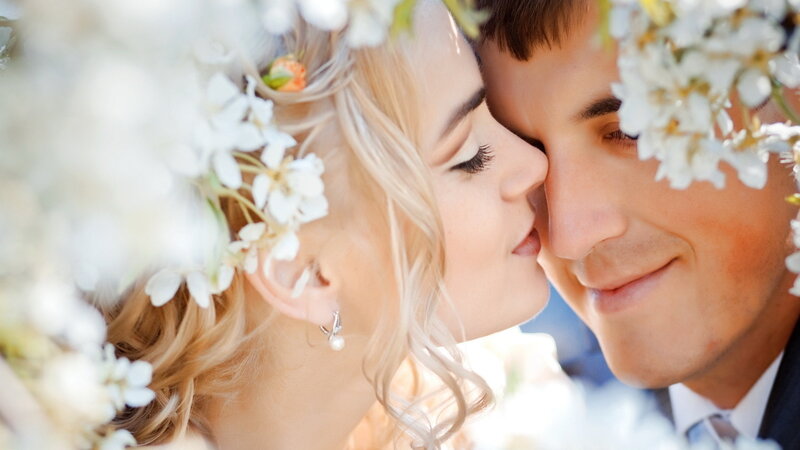 Couple Kissing in Flowers — White, Romantic