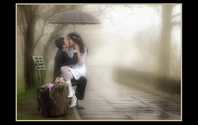Couple kissing in fog