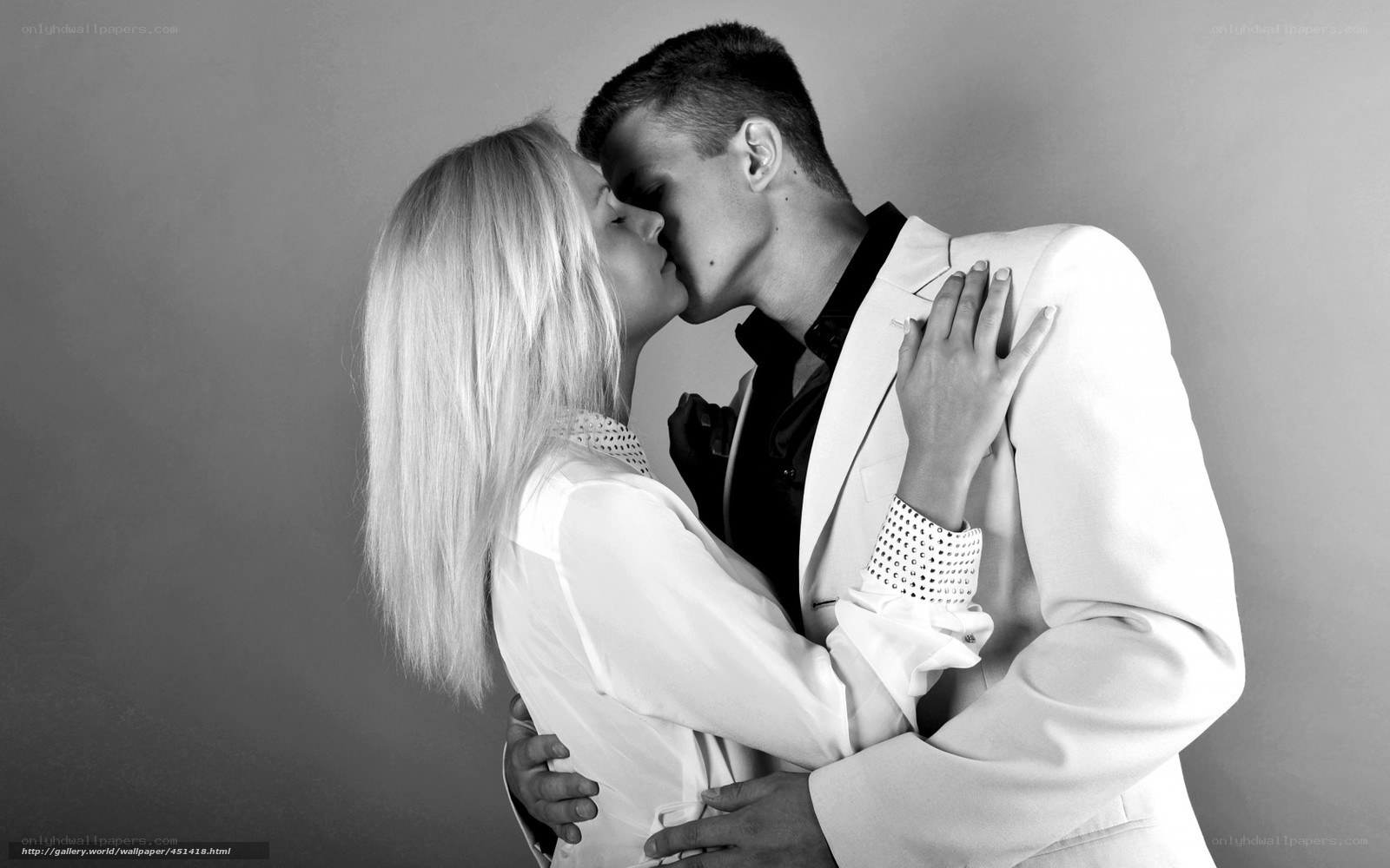 couple kissing in formal wear