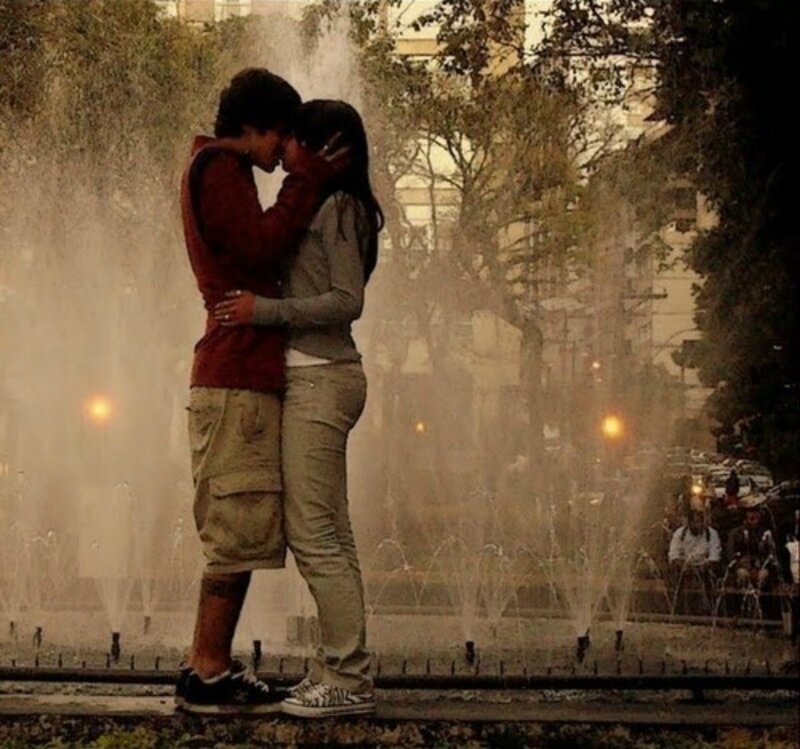 Couple Kissing in Fountain