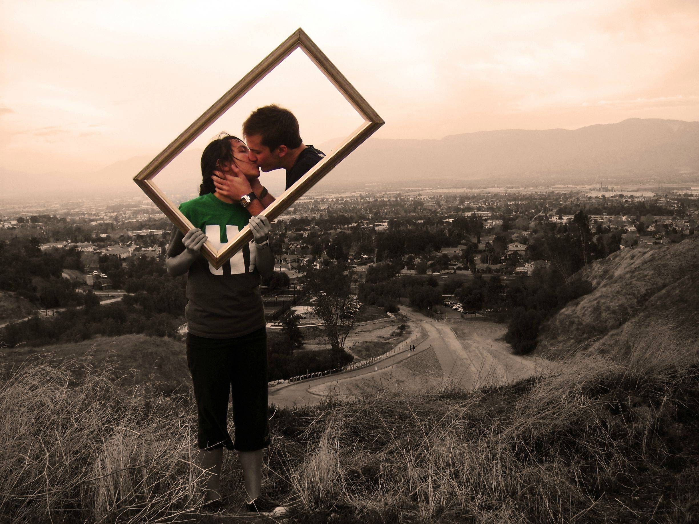 Couple kissing in frame