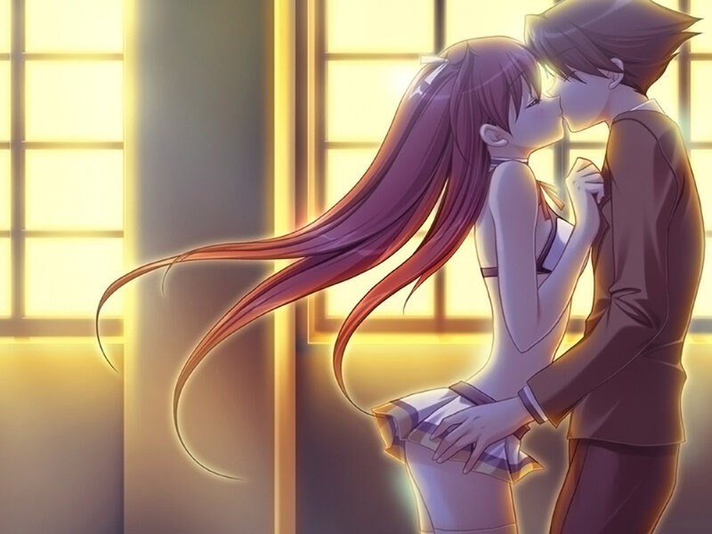 couple kissing in golden light