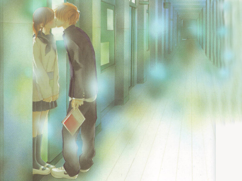 couple kissing in hallway