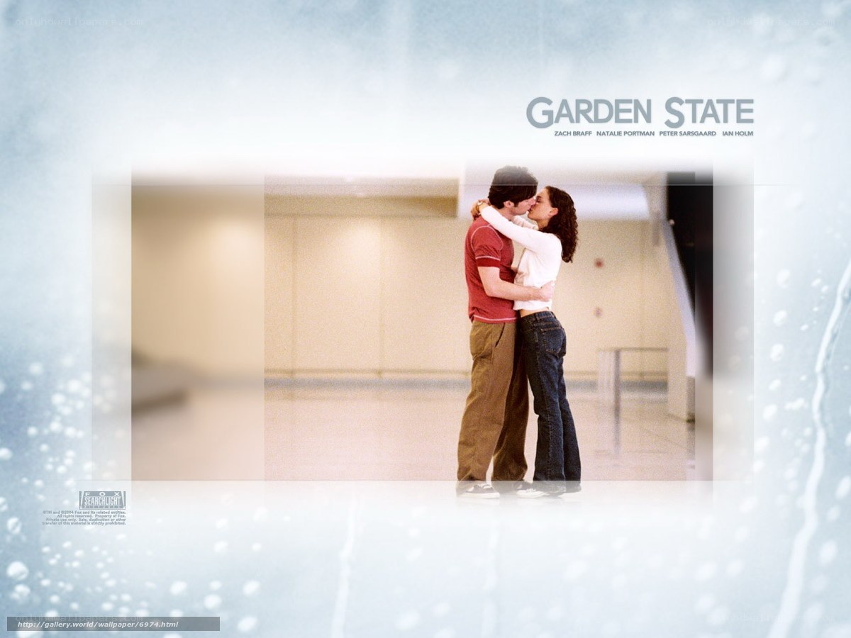 couple kissing in hallway