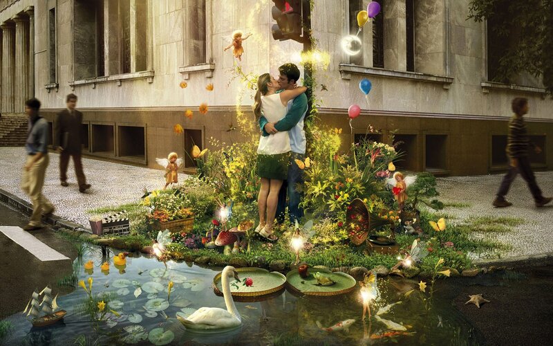 Couple kissing in magical garden