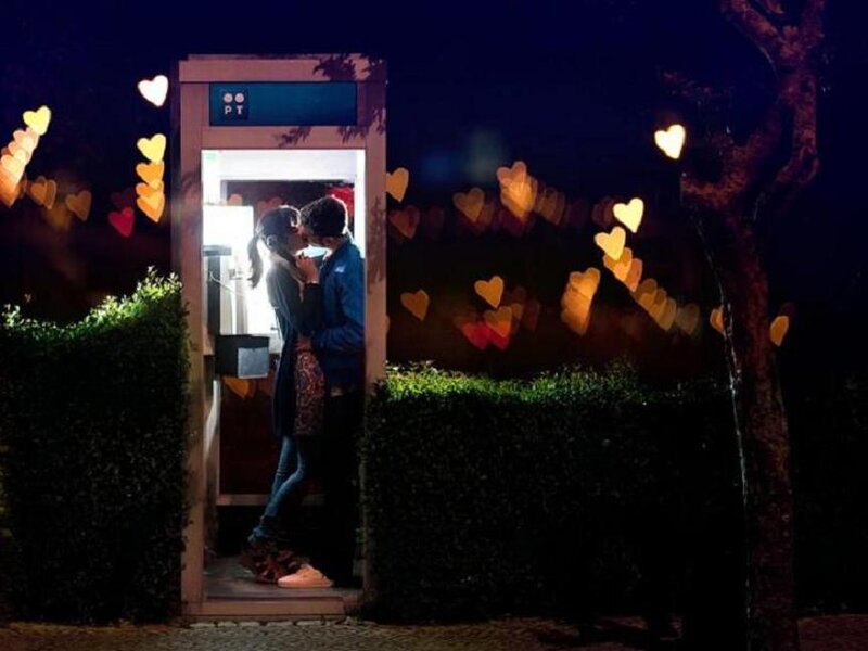 Couple Kissing in Phone Booth — Black