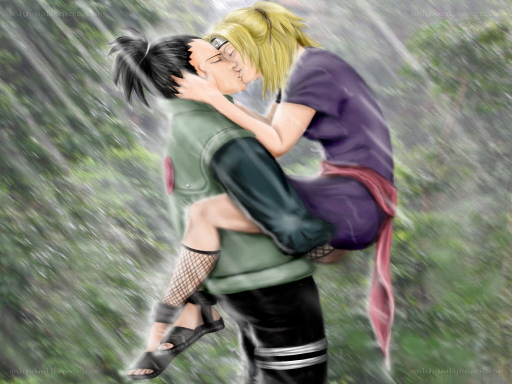 couple kissing in rain
