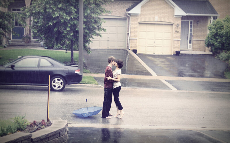 Couple Kissing in Rain — Gray, Romantic