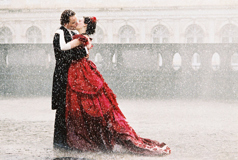 Couple Kissing in Rain — Red