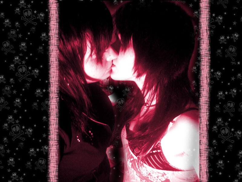 couple kissing in red light