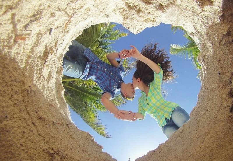 Couple Kissing in Sand