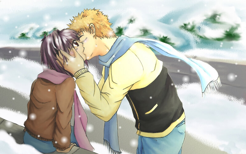 couple kissing in snow