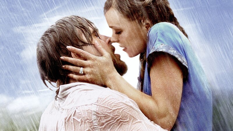couple kissing in the rain