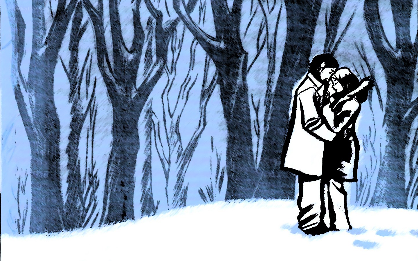 couple kissing in winter forest