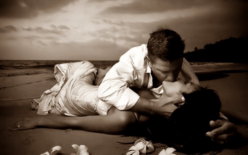 Couple Kissing on Beach — Brown