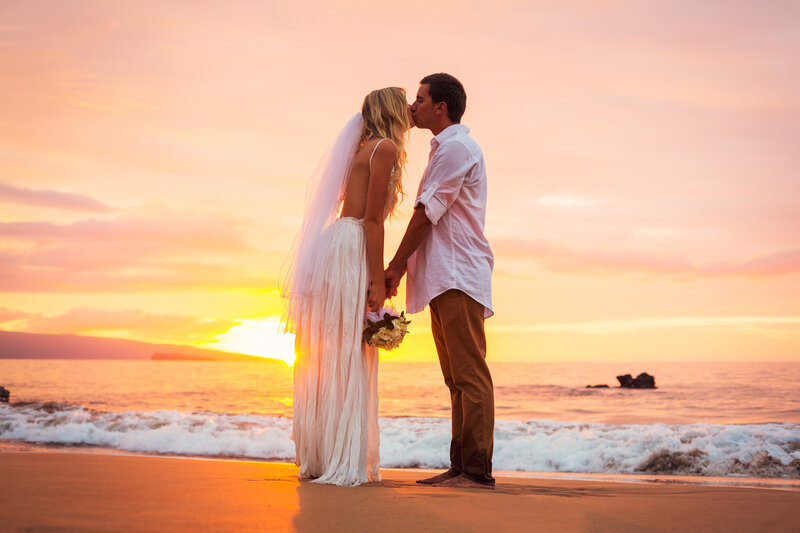 Couple Kissing on Beach — Orange, Romantic, Sunset, Photograph, Bride