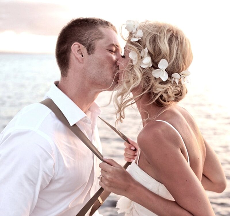 Couple Kissing on Beach — White, Romantic, Sunset, Photograph, Flowers