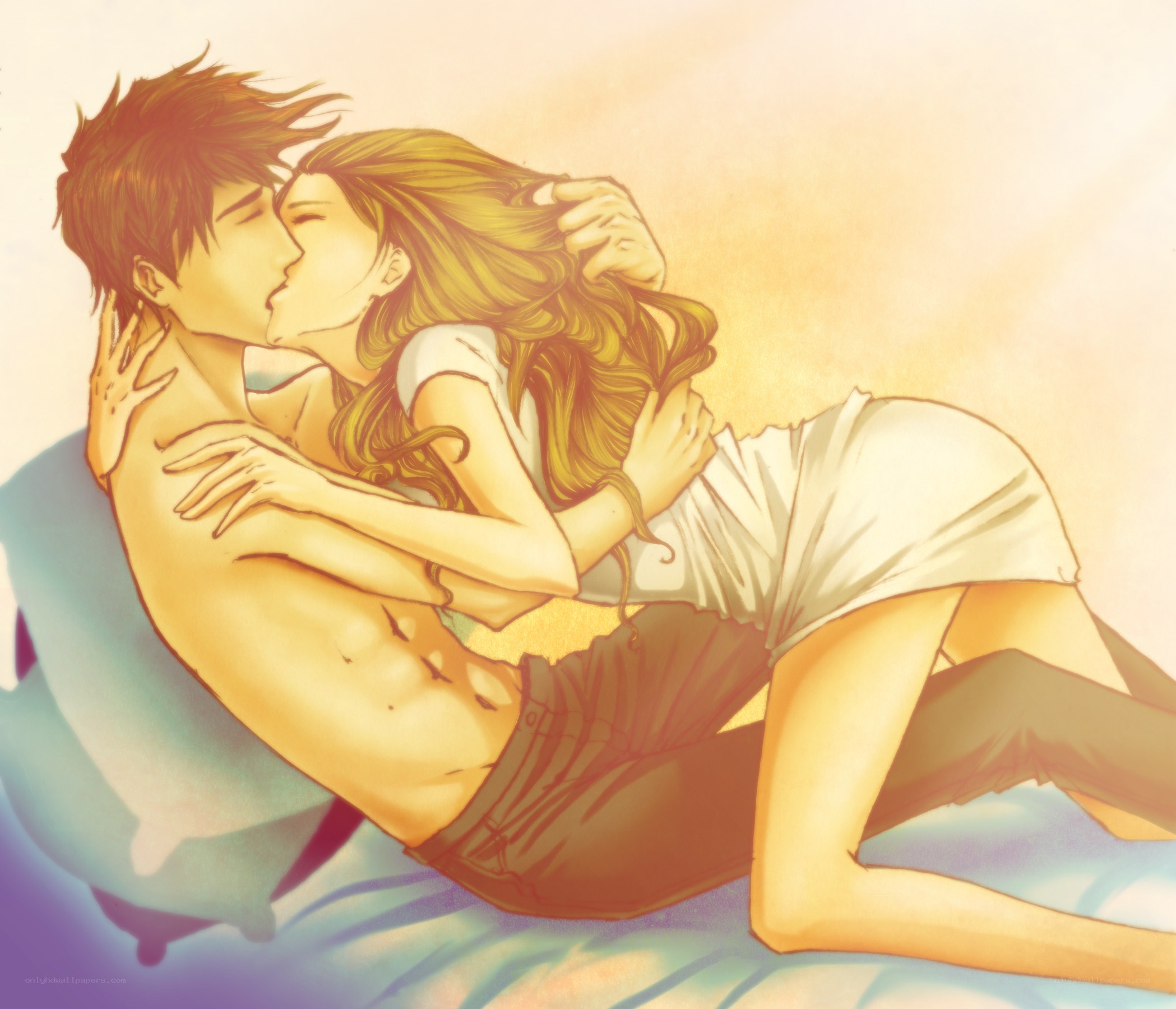 couple kissing on bed