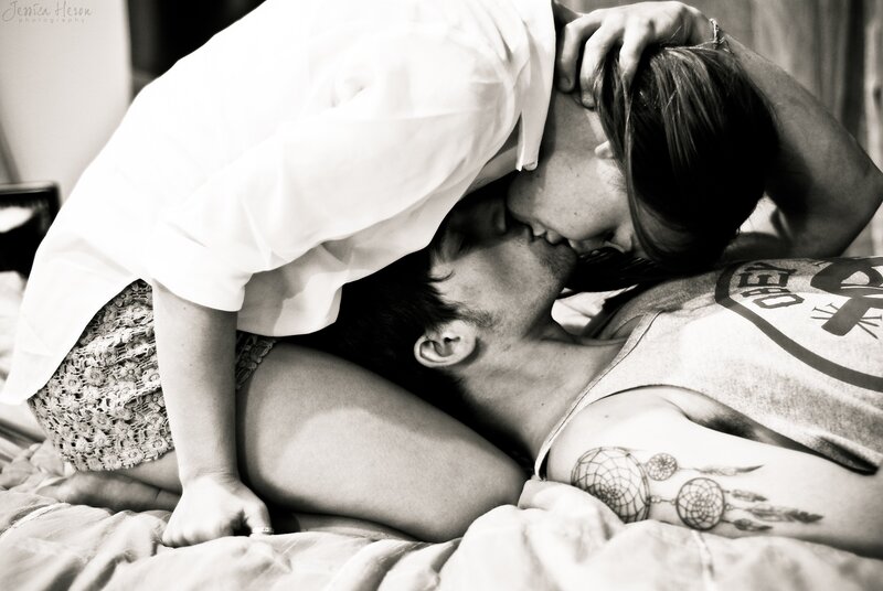 couple kissing on bed