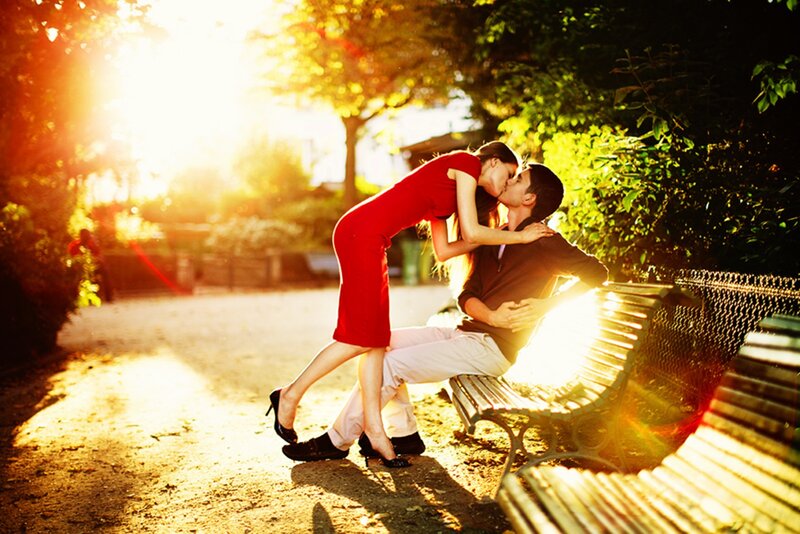 Couple Kissing on Bench — Red