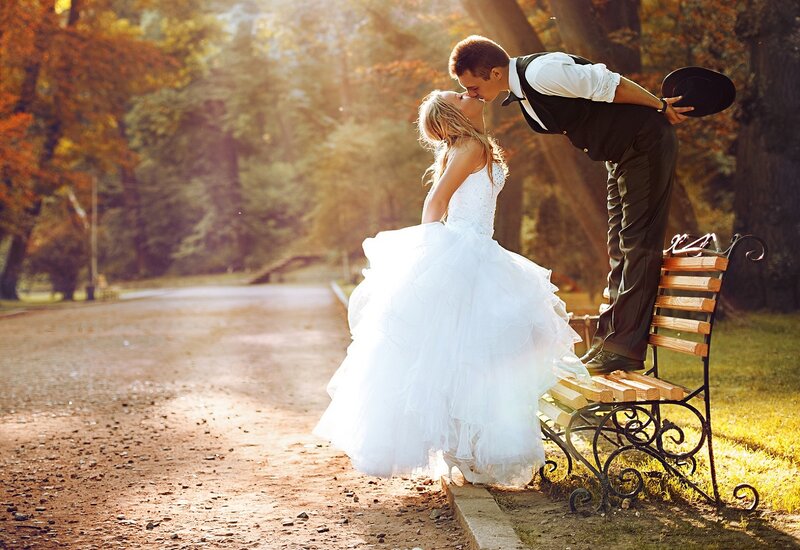 Couple Kissing on Bench — White