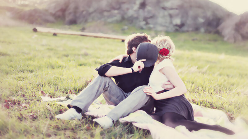 Couple Kissing on Blanket