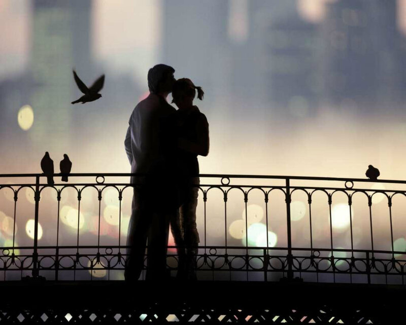 Couple Kissing on Bridge — Black, Romantic
