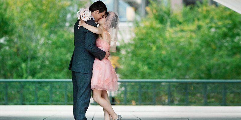 Couple Kissing on Bridge — Green, Romantic